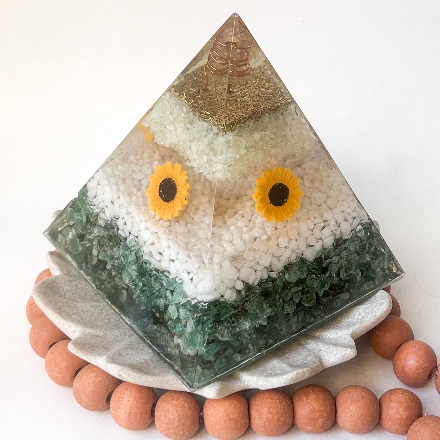 "Handmade orgonite pyramid with natural crystals for positive energy and EMF protection - sunflowers