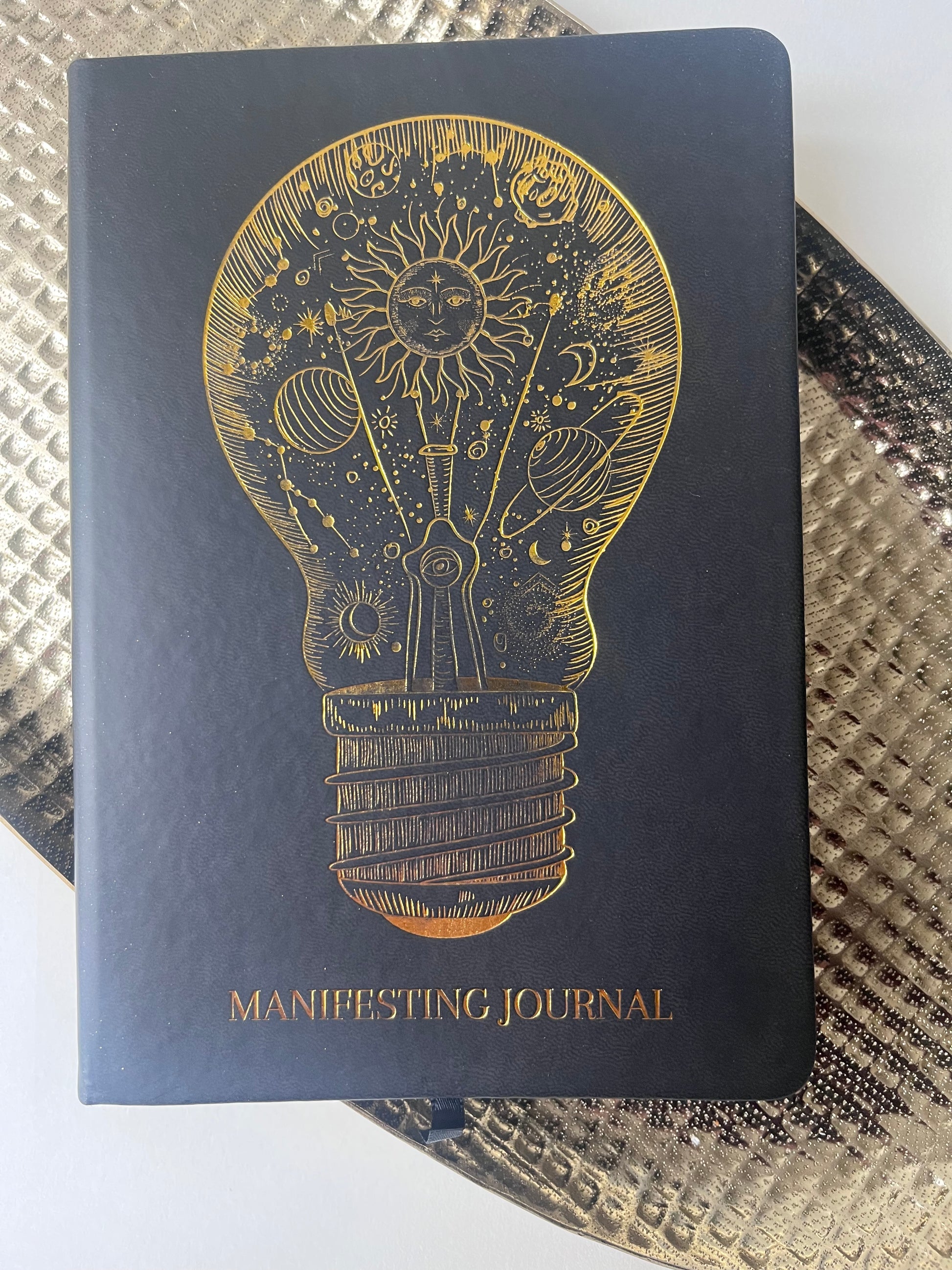 Leather Hardcover Manifesting Journal with image of lightbulb in gold foiling