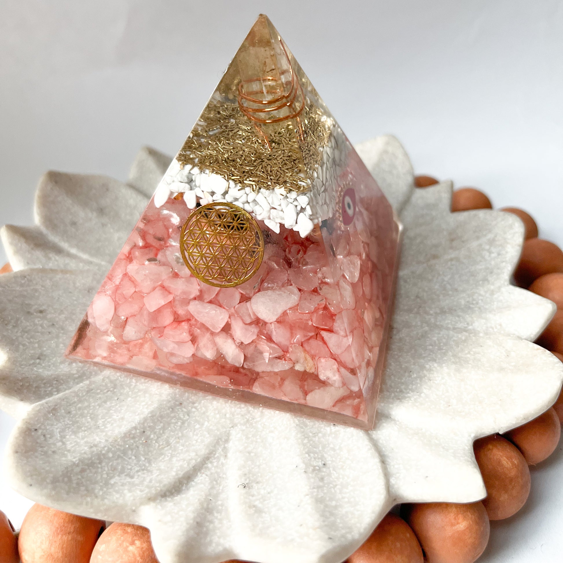 Small Rose quartz and howlite pyramid with evil eye