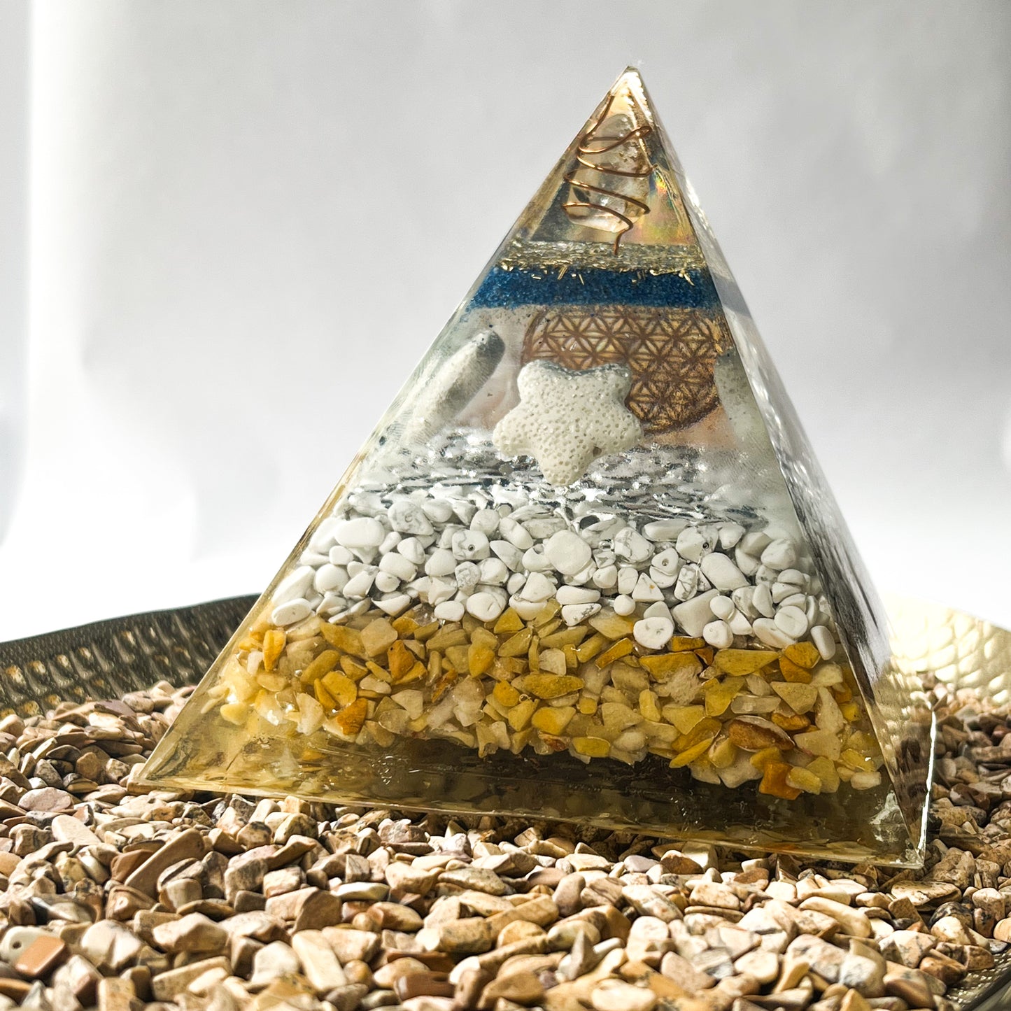 Decorative orgonite pyramid for adding a touch of spirituality to your home or office