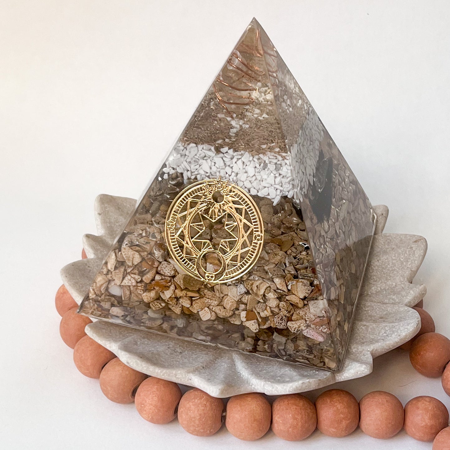 Handmade orgonite pyramid with natural crystals for positive energy and EMF protection