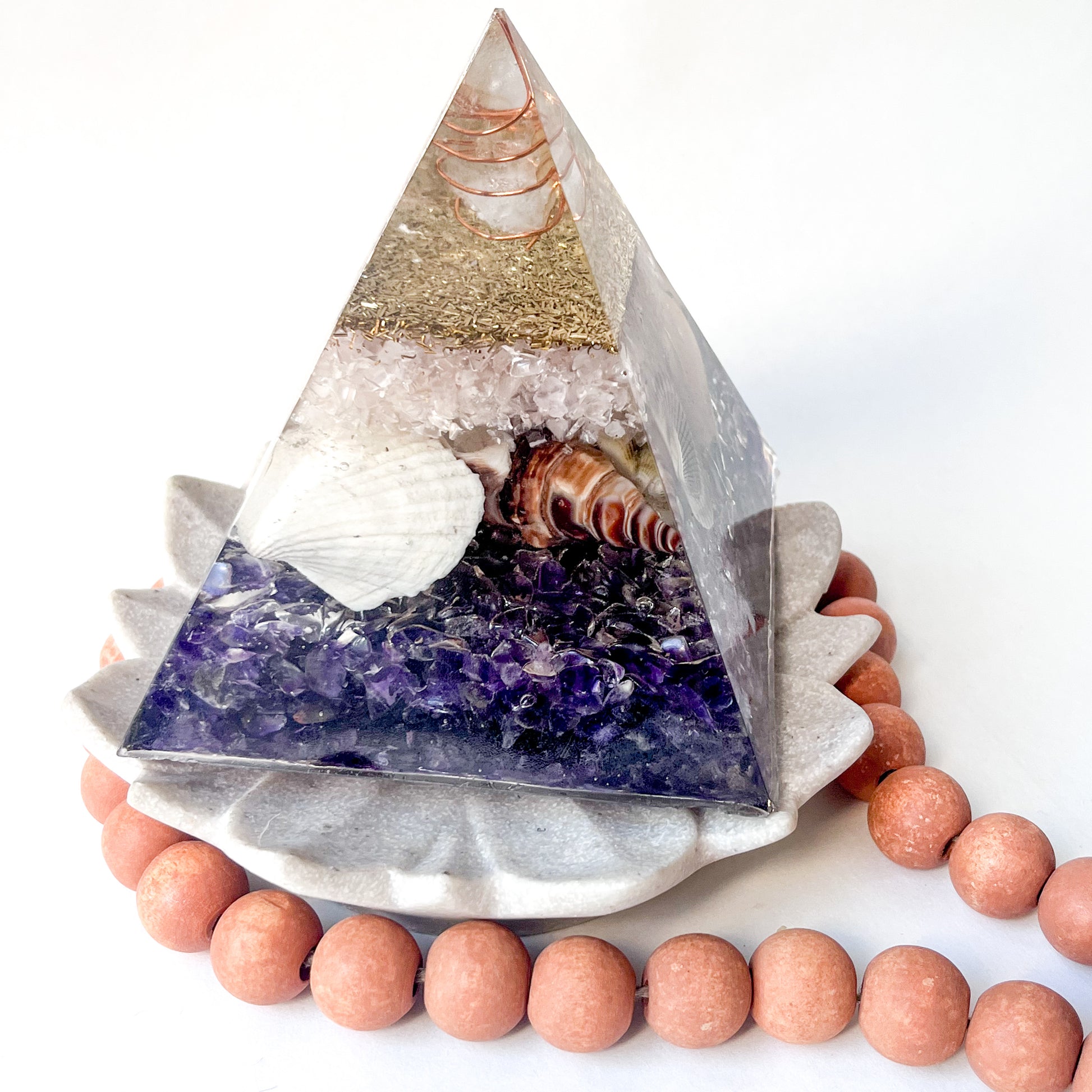 "Organic and inorganic orgonite pyramid for enhancing your aura and wellbeing